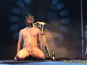 insane fetish needle show on stage